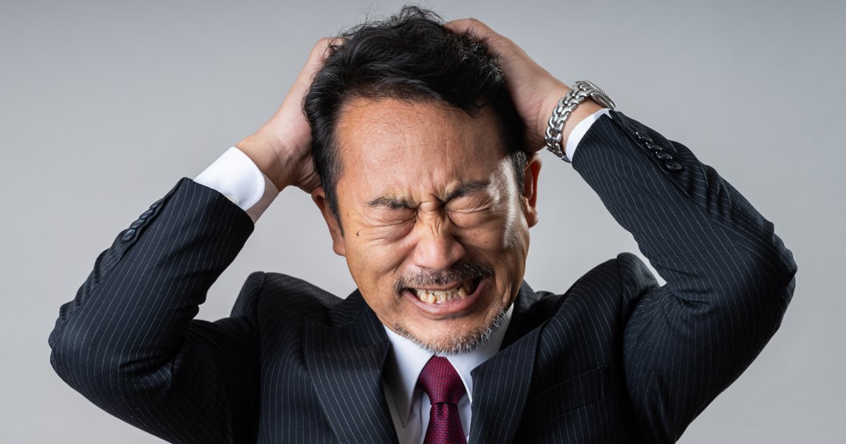 不満を抱えるビジネスパーソン