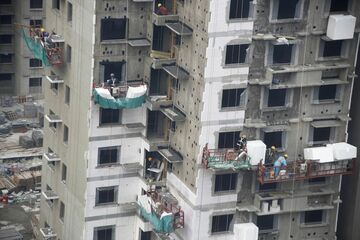 中国不動産大手の重債務、地方に土地財政の歪み