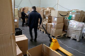米アマゾン、従業員1万9000人以上がコロナ感染か