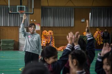 中国「共同富裕」の重圧、借金漬け地方政府に
