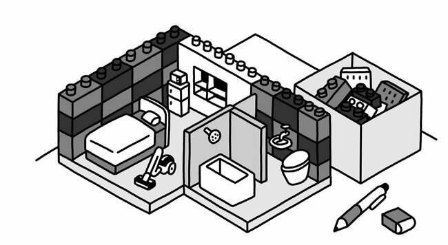 たくさんのブロックが入った箱と、レゴでできた小さな部屋