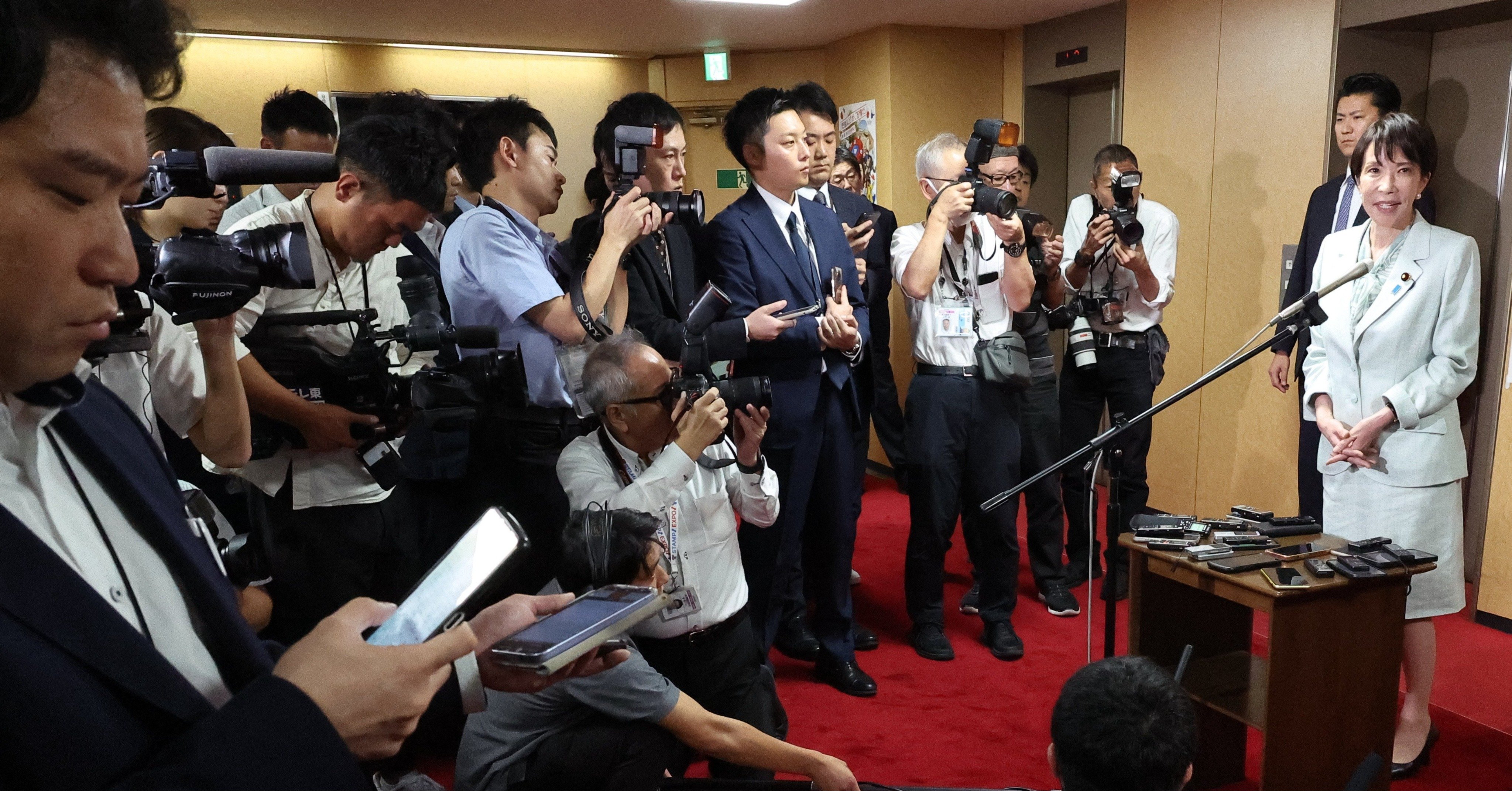 問題の発言があった10月7日の記者会見の様子 Photo:JIJI