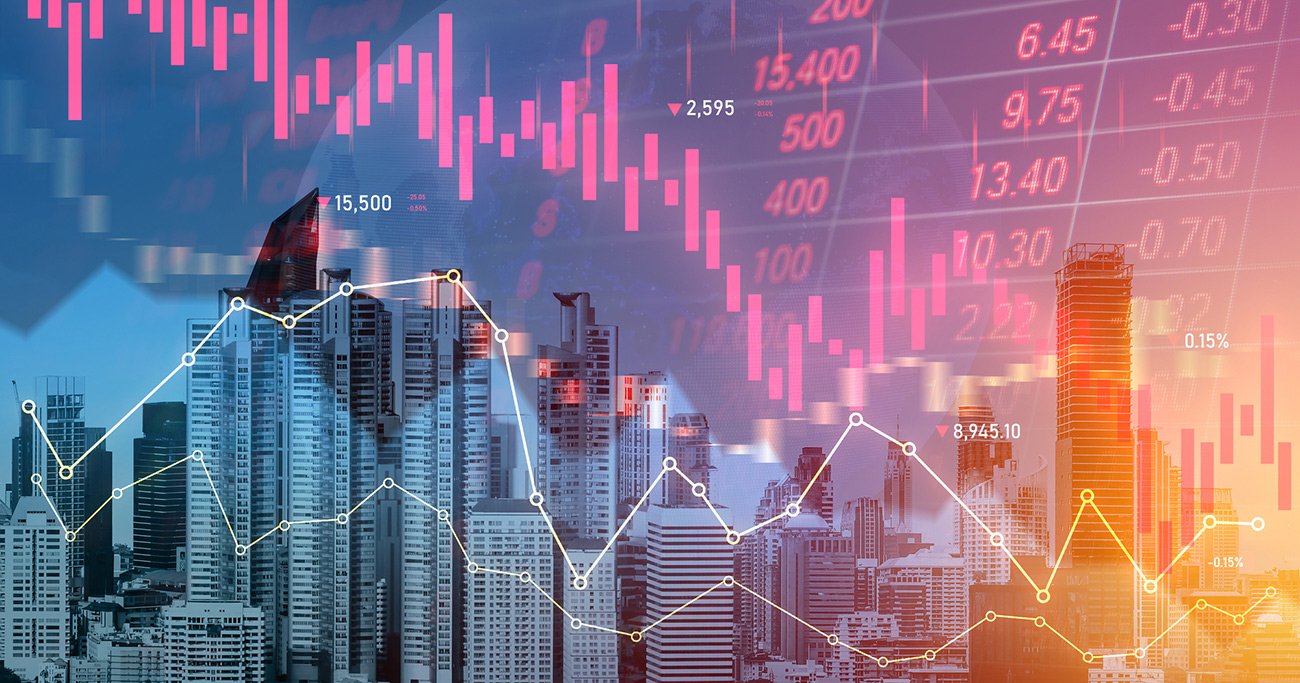 株価チャートと都市風景のイメージ