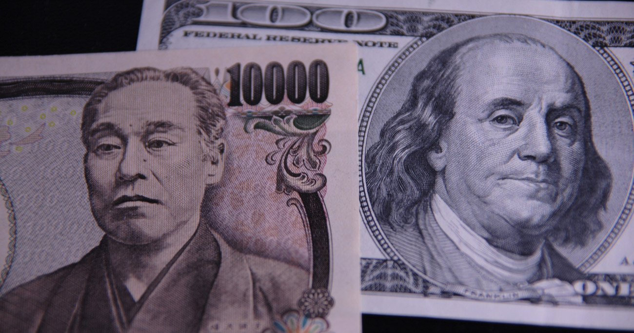 日本 円 ドル 100