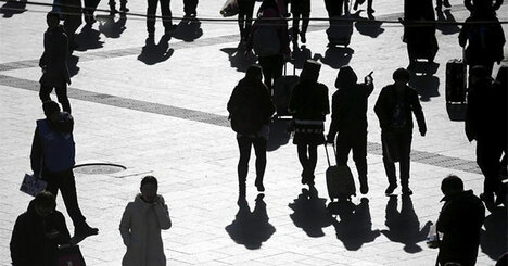 中国の人材争奪戦、都市間でヒートアップ