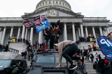 米議会占拠から1年、事件への国民の見解割れる