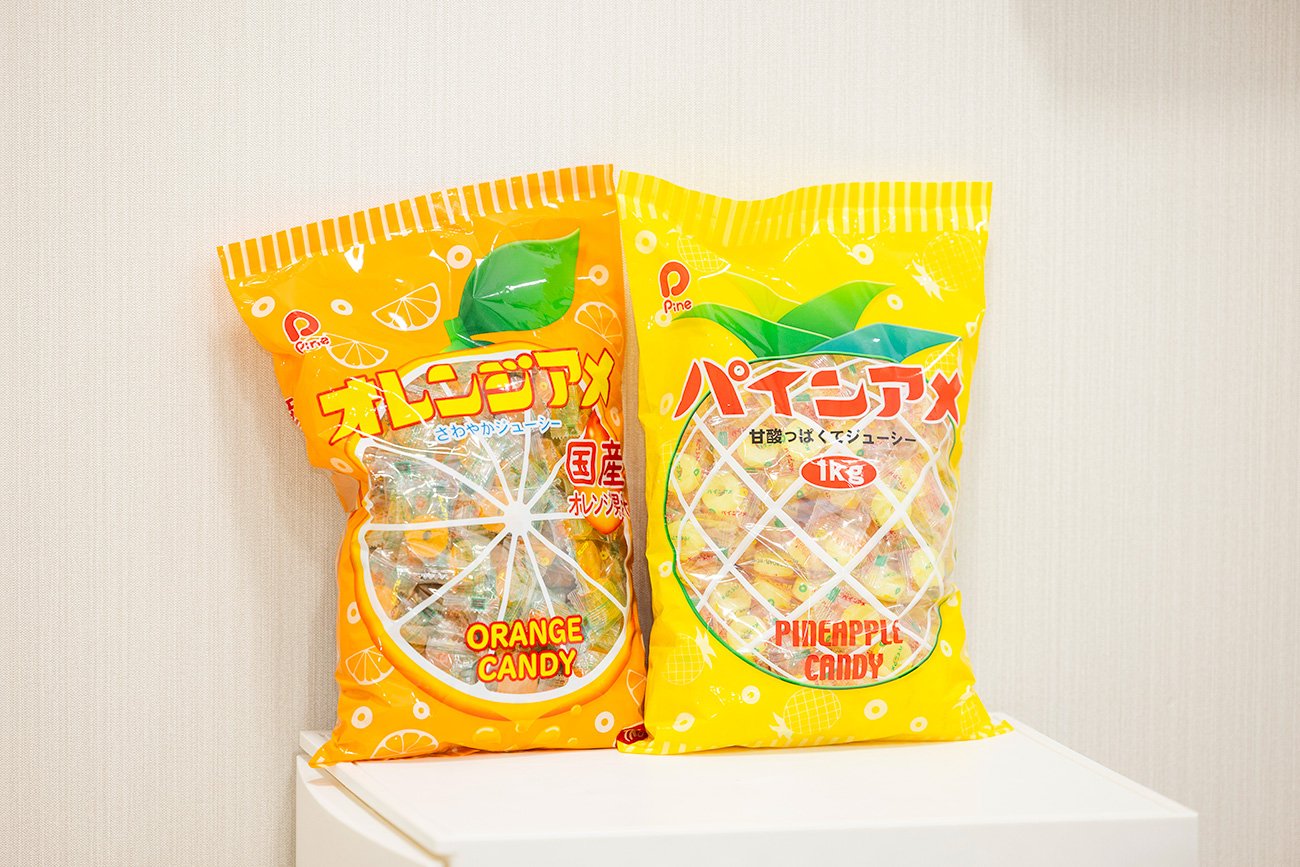 「パインアメ」人気沸騰の裏でシステムの限界に直面した老舗メーカーに伴走し、悩みを解決した業界を熟知する心強いパートナー