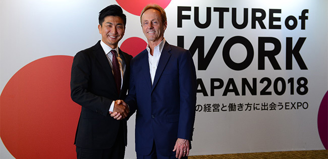 握手する両氏
