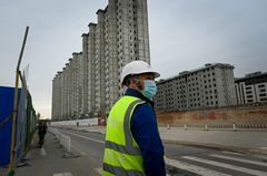 中国に「債務圧縮」の波、経済へのリスクは
