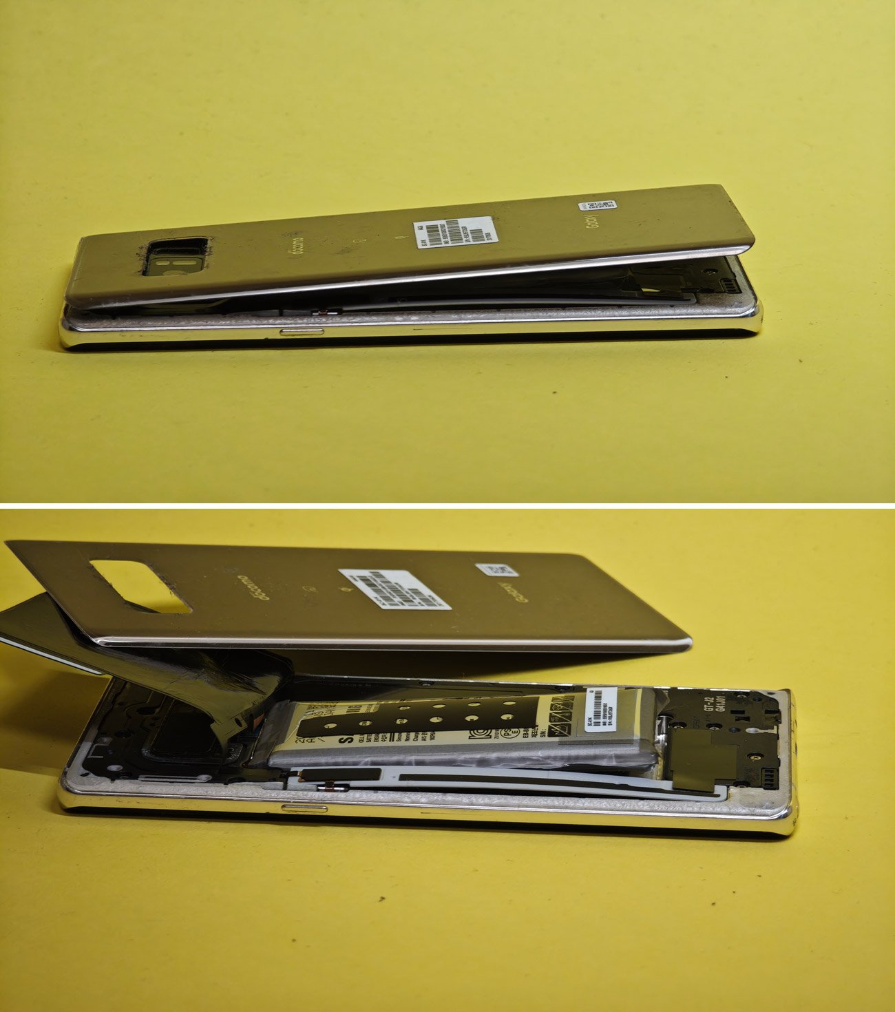 リチウムイオン電池が膨らんだ古いスマートフォン。安全対策が施されている製品でも、古くなると劣化し、電池パックが膨らんでくる