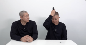 謝罪動画の最後でバリカンで頭を丸めたことも批判の的に… （YouTube「チョコレートプラネット チャンネル」より）
