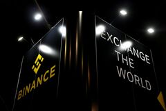 仮想通貨取引所バイナンス、株式トークン提供中止へ