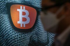 仮想通貨への認識変えたFRB、金融リスクの一つに