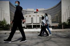 中国国債、新たな資金の逃避先として浮上