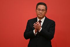 中国の李強新首相、習氏の「歯止め役」に期待