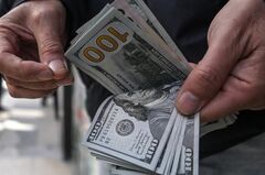 急ピッチのドル高、ウォール街に新たな難題