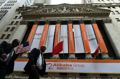 米、アリババなど中国3社を投資禁止にせず