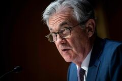 FRB、ゼロ金利と債券購入策を維持