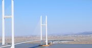 中朝を結ぶ大橋が開通へ、北朝鮮・新義州カジノタウン構想に潜む思惑
