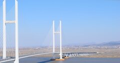 中朝を結ぶ大橋が開通へ、北朝鮮・新義州カジノタウン構想に潜む思惑