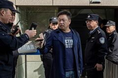 中国、人権活動家2人を拘束　北京五輪控え