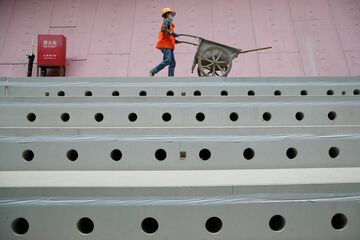重労働のギャップ埋める中国女性、賃金安くても