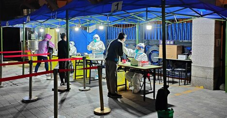 中国、新型コロナ感染急増に備える機会逃す