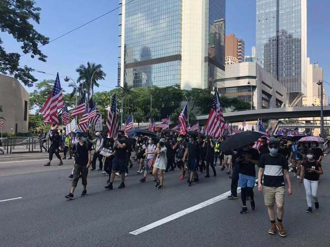 香港市民の願いを置き去りにする、習近平とトランプの「利害一致」