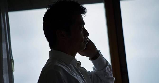 ビジネスホテルの男性