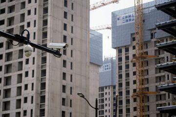 中国「監視国家」の副作用、流出情報を闇取引