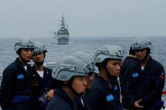 中国、台湾への強硬姿勢に転換か　「平和的な」を削除