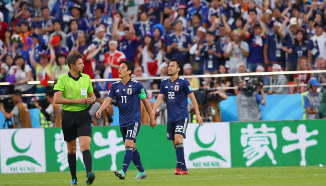 サッカーワールドカップ日本代表の試合でも、ピッチ際に中国企業の広告が見られた